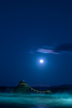Husband and Wife Rocks and full moon, Japan,Mie Prefecture,Ise city