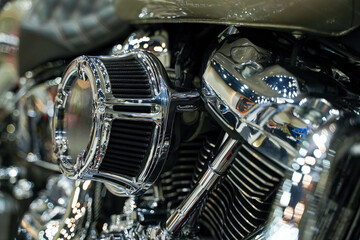 Closeup and crop air filter of Chopper motorbike with chrome colors