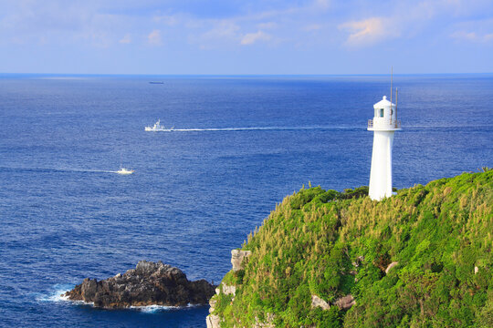 Cape Ashizuri and a fast-moving fishing boat, Shikoku,Kochi Prefecture,Tosashimizu, Kochi,Japan