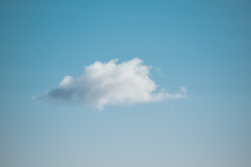 Fototapeta na wymiar Background with white, light cloud and blue sky