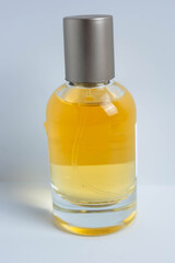 A small perfume bottle made of glass