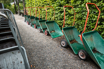 Fototapeta premium Stockholm, Sweden A row of wheelbarrows at a garden centre.