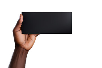 A human hand holding a blank sheet of black paper or card isolated on white background