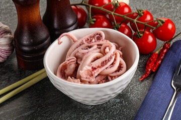 Delicous marinated squid tentacles in the bowl