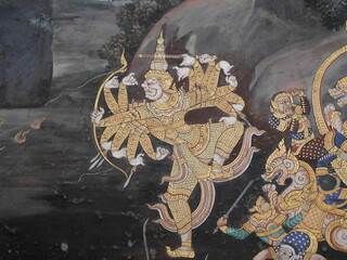 Ancient thai painting Ramayana story, Traditional Thai art of painting on Ancient wall of Thai temple, Public property in Temple of the Emerald Buddha, Bangkok,Thailand © Watthana Tirahimonch
