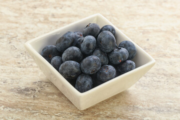 Sweet ripe blueberry heap in the bowl