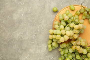 Shine Muscat Grape. Bunch of green grape on grey concrete background.