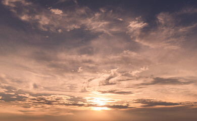 Panoramic view of sunset golden and blue sky nature background. Colorful dramatic sky with cloud at sunset.Sky background.Sky with clouds at sunset.
