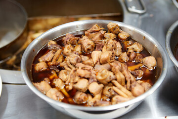 Braised chicken meat in a bowl