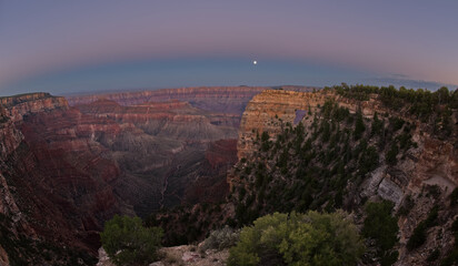 Fototapeta na wymiar Angels Window Moonrise at Grand Canyon North Rim AZ