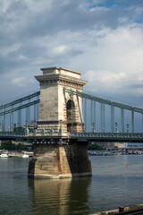 Obraz premium A part of a chain bridge in Budapest. View from Danube embankment