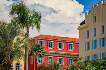 Picturesque colorful traditional old houses on a street in the Old Town, Vieille Ville in Nice, French Riviera, South of France