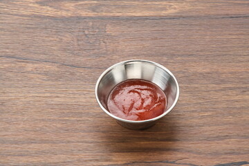 Tomato sauce (saus tomat) in a bowl, copy space
