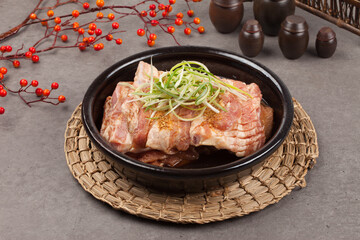 
A food made by marinating pork ribs in seasonings such as soy sauce, onion, and sugar for a...