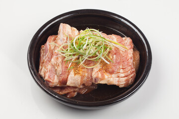 
A food made by marinating pork ribs in seasonings such as soy sauce, onion, and sugar for a...