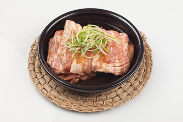 
A food made by marinating pork ribs in seasonings such as soy sauce, onion, and sugar for a...