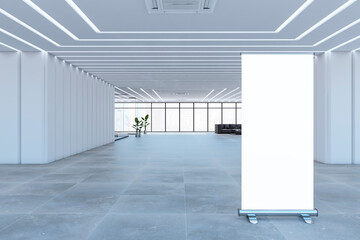 Modern spacious concrete and glass office interior with blank white mock up banner, furniture and panoramic windows with city view. 3D Rendering.