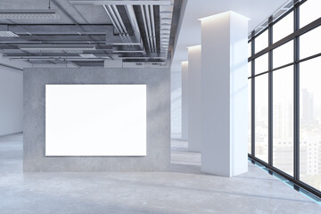 Modern empty concrete office premises interior with panoramic windows, city view, shadows and blank white mock up canvas on wall. 3D Rendering.