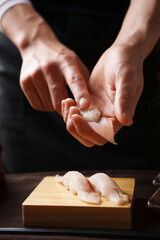 sushi on a wooden plate