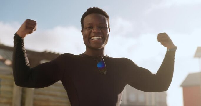 Face, outdoor and black man flexing arms, fitness and training with natural body, smile and workout. Portrait, African person and athlete with pride for progress, flex muscle and bodybuilder outside