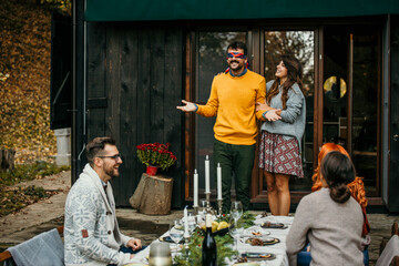 A picturesque garden table adorned with elegant place settings, invites guests to a memorable...