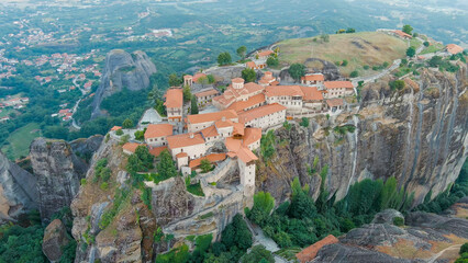 Fototapeta na wymiar Meteora, Kalabaka, Greece. Monastery of the Transfiguration of the Saviour. Meteora - rocks, up to 600 meters high. There are 6 active Greek Orthodox monasteries listed on the UNESCO list, Aerial View