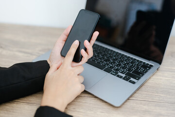 person typing on a laptop