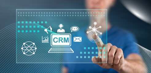 Man touching a crm concept