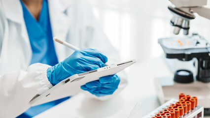 Close up scientist conducting precise virus lab test, scientific methodology, microbiologist conducting virus detection and testing in progress