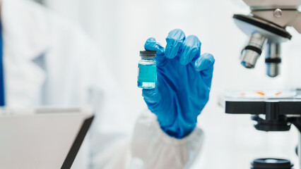 Close up scientist conducting precise virus lab test, scientific methodology, microbiologist conducting virus detection and testing in progress