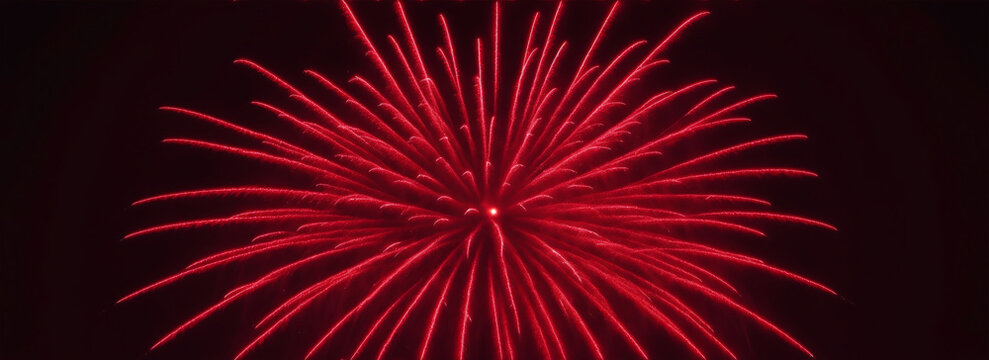 Red spinner fireworks on plain black background from Generative AI