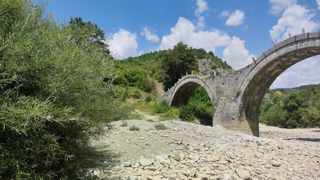 Amazing  view of Medieval Plakidas (Kalogeriko) Bridge at Pindus Mountains, Zagori, Epirus, Greece
