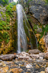 Fototapeta premium Grunas waterfall in Theth national park in summer, Albania. Albanian alps