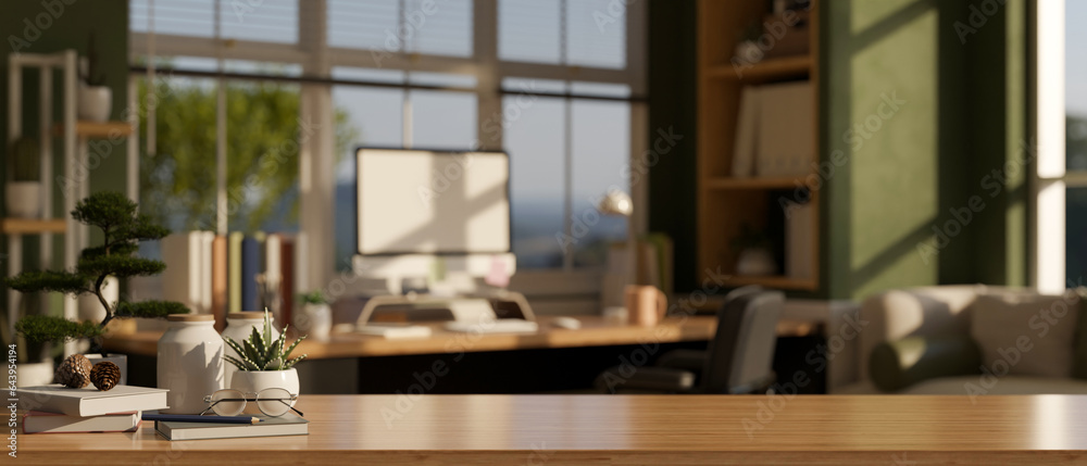 Wall mural empty space on a wooden table in a modern home office room with a computer desk against the window