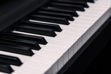 Naklejka premium Close-up of traditional black and white piano keys