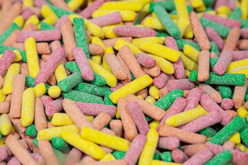 Background of colored chewy gelatin sweets, close-up.
