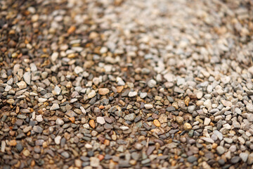 soil texture of small stones with a little water wet