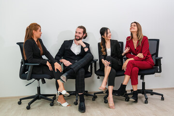Successful business team, Smiling businesspeople having a discussion in an office