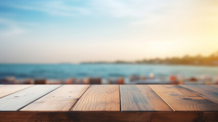 Empty wooden table top with blur background of seaside resort