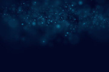 Obraz premium Bokeh light effect background. Christmas glowing dust background Christmas glowing light bokeh.