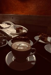 An aromatic cup of coffee in an atmospheric cafe.