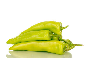 Several green chili peppers, macro, isolated on white background.