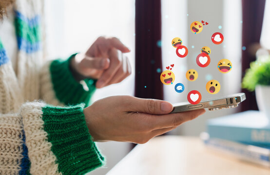 Concept of social media communication and digital online, people use smartphone playing with icon online social media, online marketing, technology, chat, post, like, follow at phone screen