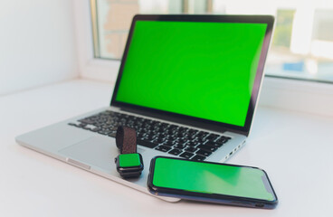 watch by use multiple internet electronic devices with green screen.