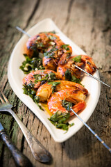 tasty fresh shrimp skewers on plate
