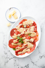 Beef carpaccio with berry sauce