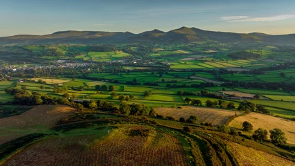 Foto auf Alu-Dibond Looking at the highest peaks of the Brecon Beacons from Pen-y-crug Iron Age hillfort overlooking Brecon town in South Wales UK  © leighton collins
