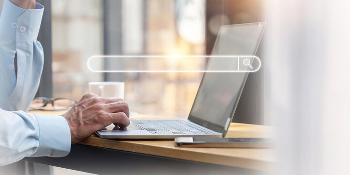 Search technology, search engine optimization, businessperson using laptop to search information, using search bar function on your website