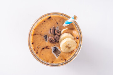 Blended banana coffee. Cold latte coffee and banana non-dairy, vegan diet drink with frozen bananas...