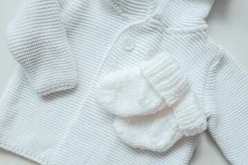 Knitted children's socks and handmade sweater